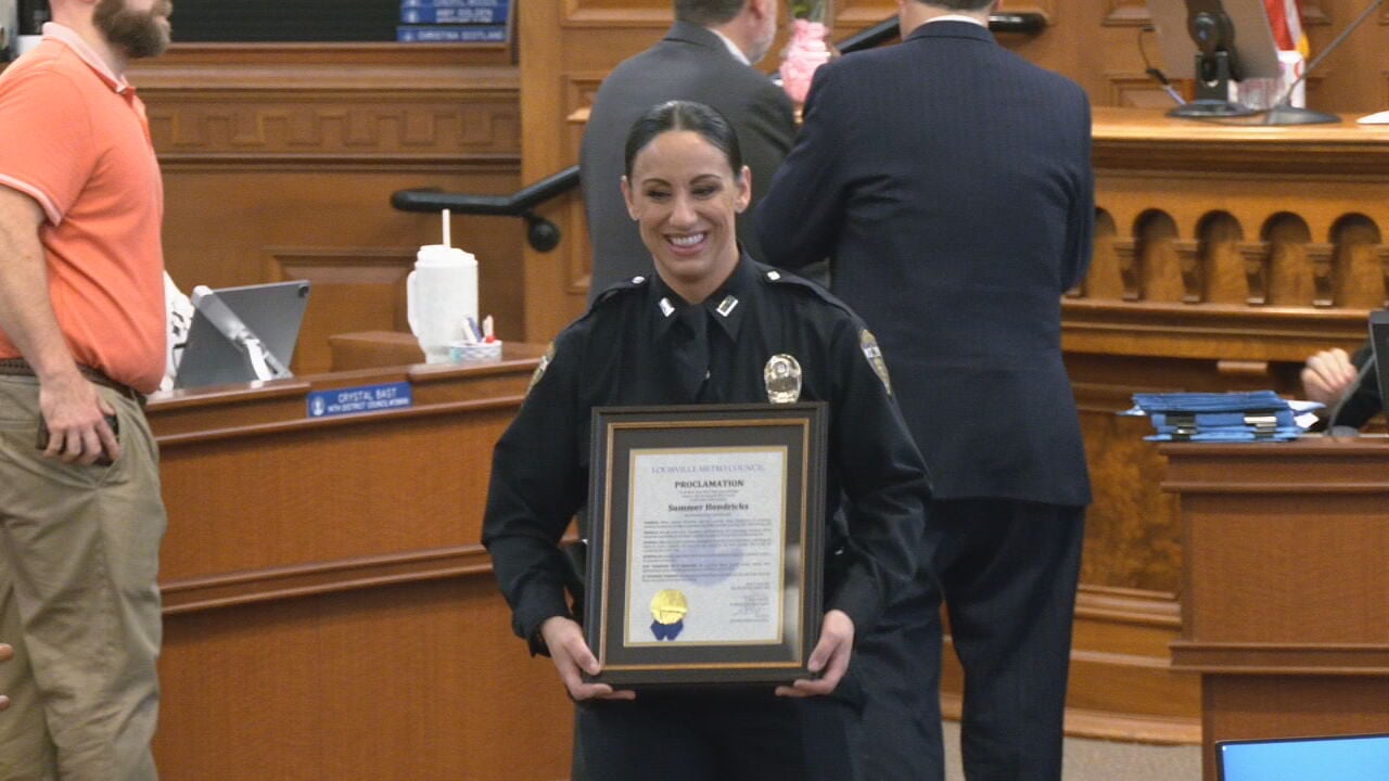Louisville officer honored for saving man in distress on overpass
